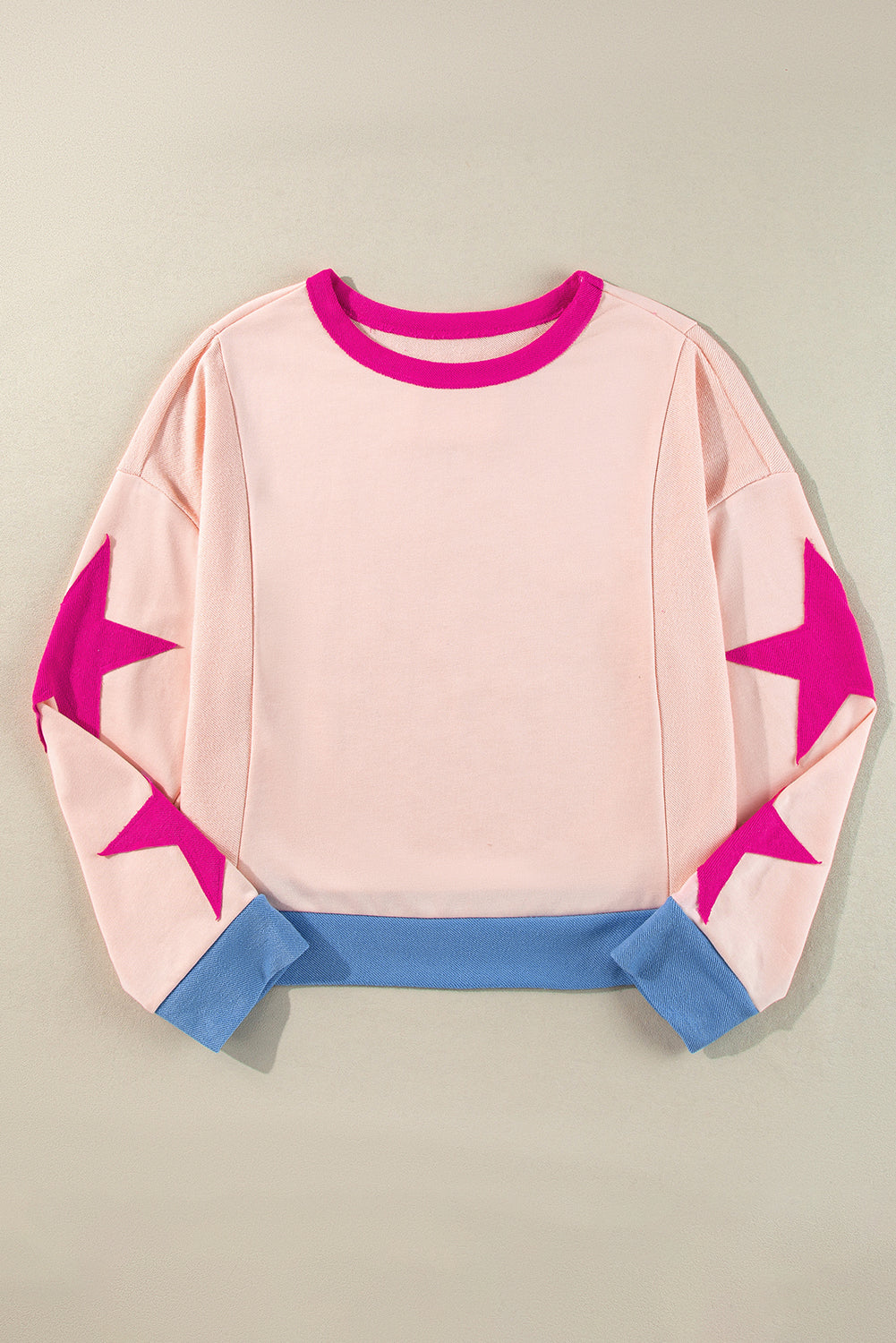 Arabella – Oversized Star Patchwork Sweatshirt with Exposed Seams