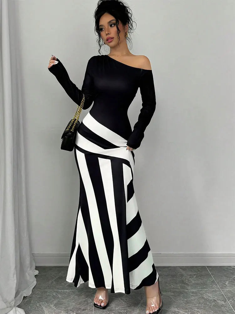 Delilah – Black and White Patchwork Maxi Dress
