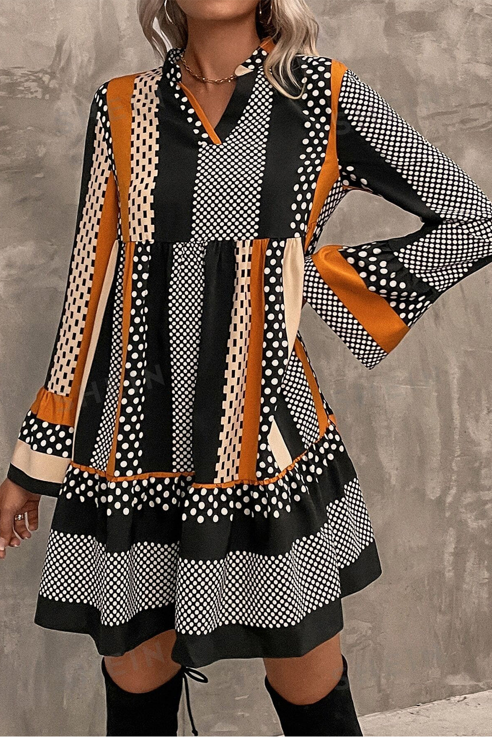Lilah – Black Mixed Print Mini Dress with Ruffled Hem & V-Neck