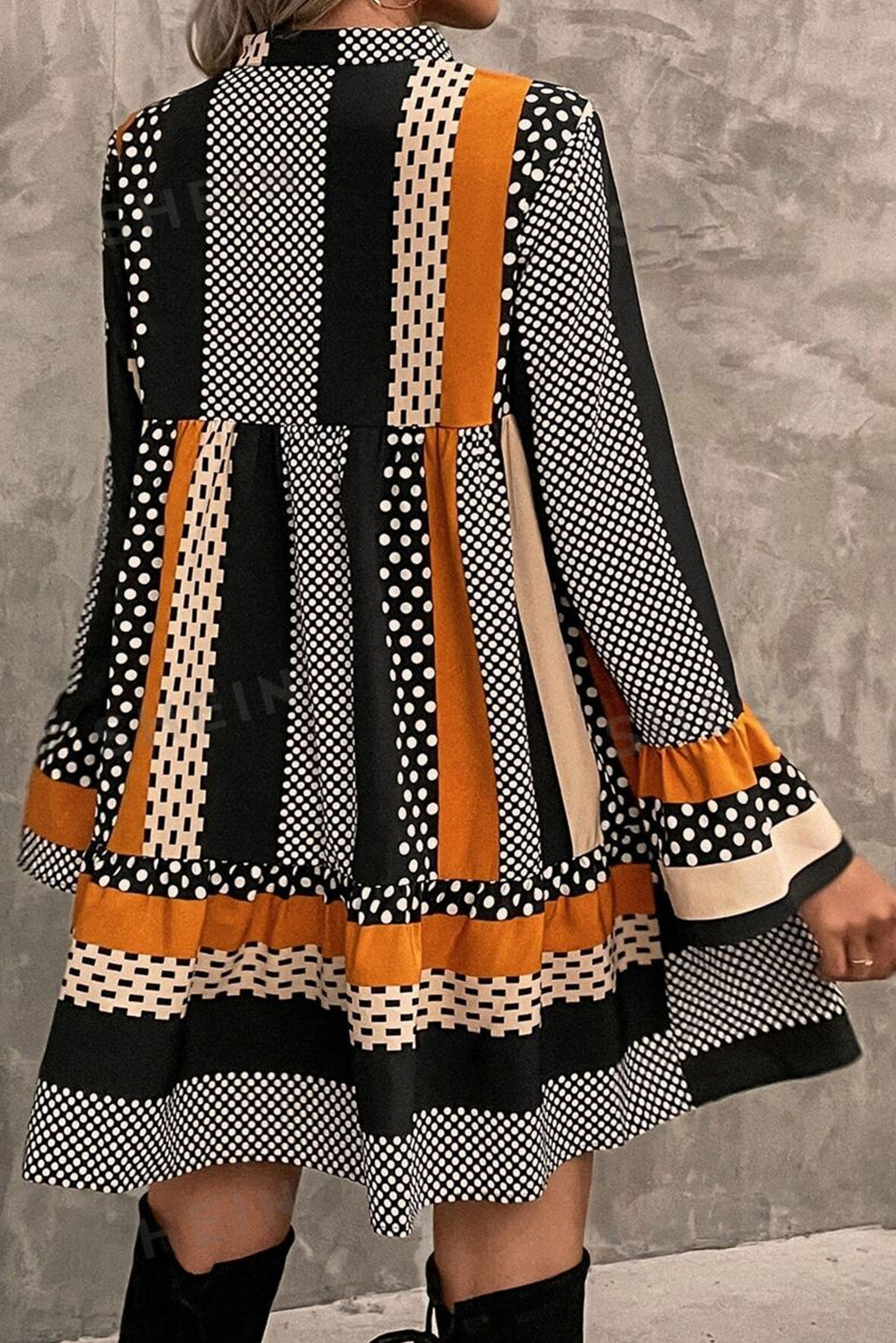 Lilah – Black Mixed Print Mini Dress with Ruffled Hem & V-Neck